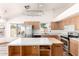 Well-lit kitchen with modern appliances, center island, and ample storage, perfect for cooking at 2356 N Glenview --, Mesa, AZ 85213