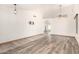 Bright living room showcasing hardwood flooring, neutral paint and modern fixtures at 2356 N Glenview --, Mesa, AZ 85213