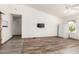 Spacious living room featuring modern flooring, neutral walls, and plenty of natural light at 2356 N Glenview --, Mesa, AZ 85213