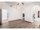 Large main bedroom with ceiling fan, and doorways to ensuite bathroom and walk-in closet at 2356 N Glenview --, Mesa, AZ 85213