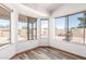 Cozy sunroom with large windows offering backyard views and natural light, great for relaxing at 2356 N Glenview --, Mesa, AZ 85213