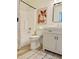 Neutral bathroom features a shower-tub combo, toilet, and vanity for essential bathroom needs at 2358 E Peach Tree Dr, Chandler, AZ 85249