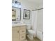 Bathroom with a tub-shower combo, vanity, and modern fixtures creates a functional and inviting space at 2358 E Peach Tree Dr, Chandler, AZ 85249
