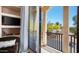 Balcony view showing desert landscaping, blue sky, and community homes at 2418 W Jake Hvn, Phoenix, AZ 85085