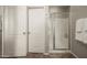 Clean bathroom with glass-enclosed shower and convenient towel rack at 2418 W Jake Hvn, Phoenix, AZ 85085