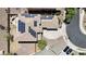 Aerial shot of home featuring solar panels, driveway, and a well-maintained backyard at 26529 N 167Th Ave, Surprise, AZ 85387