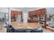 Spacious kitchen with stainless steel appliances, granite countertops, and stylish seating at the large island at 26529 N 167Th Ave, Surprise, AZ 85387