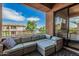 Relax on this balcony with wicker-style furniture and enjoy expansive views of the surrounding community and sky at 2989 N 44Th St # 3044, Phoenix, AZ 85018