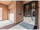 Exterior view of a building entrance and garage with neutral paint and visible address numbers at 2989 N 44Th St # 3044, Phoenix, AZ 85018