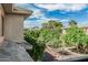Street view of the community featuring tree-lined streets and well-maintained landscaping under a bright blue sky at 2989 N 44Th St # 3044, Phoenix, AZ 85018