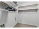 Spacious walk-in closet with built-in shelving and ample storage space at 2989 N 44Th St # 3044, Phoenix, AZ 85018
