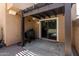 Cozy back patio with pergola, grill, and sliding glass door. Ideal for relaxing and dining outdoors at 3020 E Megan St, Gilbert, AZ 85295