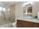 Well-lit bathroom showcasing modern vanity with vessel sink, glass-enclosed shower, and contemporary finishes at 340 E Osborn Rd # 1, Phoenix, AZ 85012
