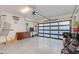 Spacious two-car garage with epoxy flooring, modern sectional garage door, and ample storage space at 340 E Osborn Rd # 1, Phoenix, AZ 85012