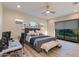 Bright and airy main bedroom featuring a king bed, stylish furnishings, and plenty of natural light at 340 E Osborn Rd # 1, Phoenix, AZ 85012