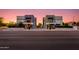 Street view showcasing modern townhomes with balconies and neat landscaping at 340 E Osborn Rd # 1, Phoenix, AZ 85012