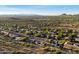 An aerial view of a charming desert community with scenic mountain views, near hiking trails at 3551 W Hidden Mountain Ln, Anthem, AZ 85086