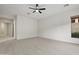 Spacious bedroom with a ceiling fan, large window, and ample natural light at 3551 W Hidden Mountain Ln, Anthem, AZ 85086