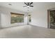 Inviting bedroom with large windows, natural light, and a ceiling fan at 3551 W Hidden Mountain Ln, Anthem, AZ 85086