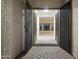 Grand entryway featuring double doors leading into a bright, open living space at 3551 W Hidden Mountain Ln, Anthem, AZ 85086