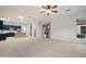 Open-concept living space featuring a modern kitchen and seamless access to the outdoor area at 3551 W Hidden Mountain Ln, Anthem, AZ 85086