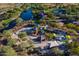 Aerial shot of the community playground featuring multiple play structures and shaded seating areas at 3551 W Hidden Mountain Ln, Anthem, AZ 85086