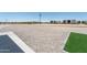 Large backyard area with gravel, artificial turf, and potential for landscaping to create an outdoor oasis at 3887 S 331St Ave, Tonopah, AZ 85354