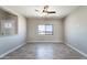 Bedroom with wood-look tile flooring, ceiling fan and natural light at 3887 S 331St Ave, Tonopah, AZ 85354