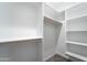 Walk-in closet featuring shelving and clothing rods providing ample storage at 3887 S 331St Ave, Tonopah, AZ 85354