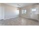 Entryway with wood-look tile flooring, neutral paint, and natural light at 3887 S 331St Ave, Tonopah, AZ 85354