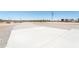 Expansive yard area with concrete and gravel, providing ample space for outdoor activities and landscaping at 3887 S 331St Ave, Tonopah, AZ 85354