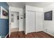 Bright bedroom with closet and entry to additional room at 4245 E Shannon St, Gilbert, AZ 85295