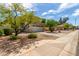 Charming two-story home with neutral paint, desert landscaping, and two car garage at 4245 E Shannon St, Gilbert, AZ 85295