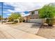 Charming two-story home with neutral paint, desert landscaping, and two car garage at 4245 E Shannon St, Gilbert, AZ 85295