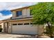 Charming two-story home with neutral paint and a two car garage at 4245 E Shannon St, Gilbert, AZ 85295