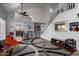 Open-concept living area with stairs, views of the kitchen, and modern decor at 4245 E Shannon St, Gilbert, AZ 85295