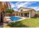 View of the backyard featuring a pool and covered patio at 4245 E Shannon St, Gilbert, AZ 85295