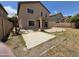 Backyard featuring a patio slab at 44328 W Knauss Dr, Maricopa, AZ 85138