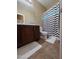 Bathroom featuring a vanity and a patterned shower curtain at 44328 W Knauss Dr, Maricopa, AZ 85138