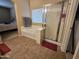 Bathroom featuring a separate shower and jacuzzi at 44328 W Knauss Dr, Maricopa, AZ 85138