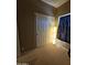 Bedroom featuring a mirrored closet at 44328 W Knauss Dr, Maricopa, AZ 85138