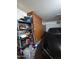 Garage with ample storage cabinets and organization, providing convenient space for vehicles and belongings at 44328 W Knauss Dr, Maricopa, AZ 85138