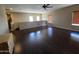 Bright and airy loft with dark wood flooring and plenty of space, great for versatile use at 44328 W Knauss Dr, Maricopa, AZ 85138