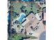 Aerial view of property featuring a pool, mature landscaping, privacy wall and a well-maintained grassy backyard at 4442 E Redfield Rd, Phoenix, AZ 85032