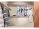 Spacious walk-in closet with plenty of hanging storage and shelving for optimal organization at 4442 E Redfield Rd, Phoenix, AZ 85032