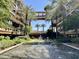 Lush courtyard featuring a water feature, palm trees, and well-maintained landscaping creating a serene environment at 7157 E Rancho Vista Dr # 2005, Scottsdale, AZ 85251