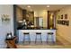 Modern kitchen with sleek countertops, stainless steel appliances, and stylish bar stools at the island at 7157 E Rancho Vista Dr # 2005, Scottsdale, AZ 85251