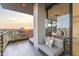 Inviting balcony space with seating and stunning sunset and city views at 7180 E Kierland Blvd # 1218, Scottsdale, AZ 85254