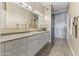 Full bathroom featuring double sink vanity, modern lighting, and large walk-in shower at 7180 E Kierland Blvd # 1218, Scottsdale, AZ 85254