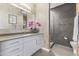 Sleek bathroom with modern vanity, quartz countertop, and luxurious shower in a contemporary home at 7180 E Kierland Blvd # 1218, Scottsdale, AZ 85254